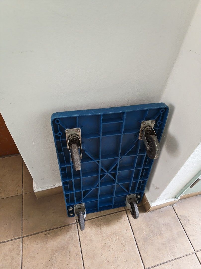 Blue Plastic Platform trolley with Wheels (Category: Everything Else) located in Singapore. Submitted by bestvalueclearance (Listing ID 1436320028, Image 1). Description: - Blue plastic platform dolly - Durable construction - Ideal for moving boxes, furniture, and other heavy items - Four wheels - Suitable for home or office use 200kg.