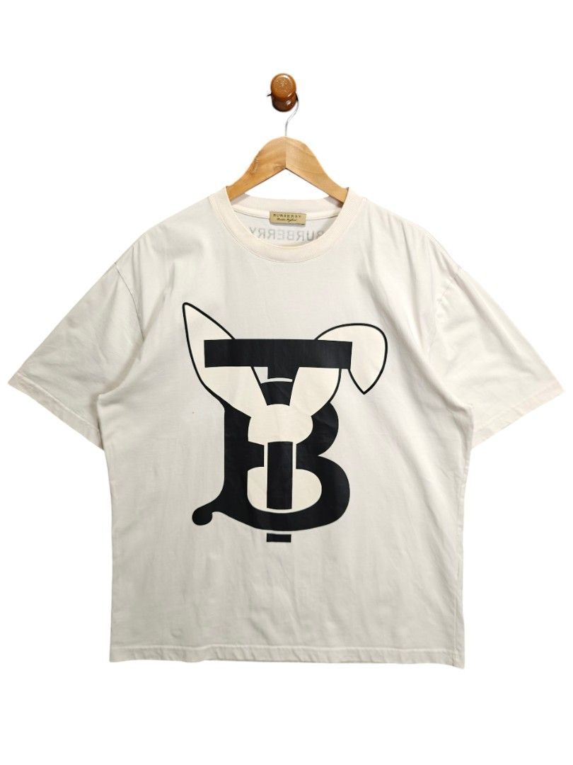 SALE ❗Burberry TB Logo T-shirt (Category: Tshirts & Polo Shirts ) located in Alaminos. Submitted by epargne (Listing ID 1436292037, Image 1). Description: 🏷️ Burberry TB Logo Condition: Vgood ! Color rate: 9/10 Size: Large - XL Measurement: ⬇️⬇️⬇️ Length' 29 'Width' 23.5 Issue: Dot stain see last photo. See picture for details ⬇️⬇️⬇️.