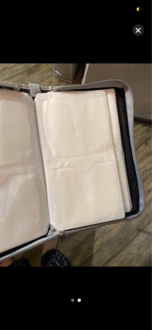 CD Case (Category: CDs & DVDs) located in Singapore. Submitted by quickbear.e86a3f (Listing ID 1436323919, Image 2). Description: - Holds 80 CDs - Secure zipper closure.