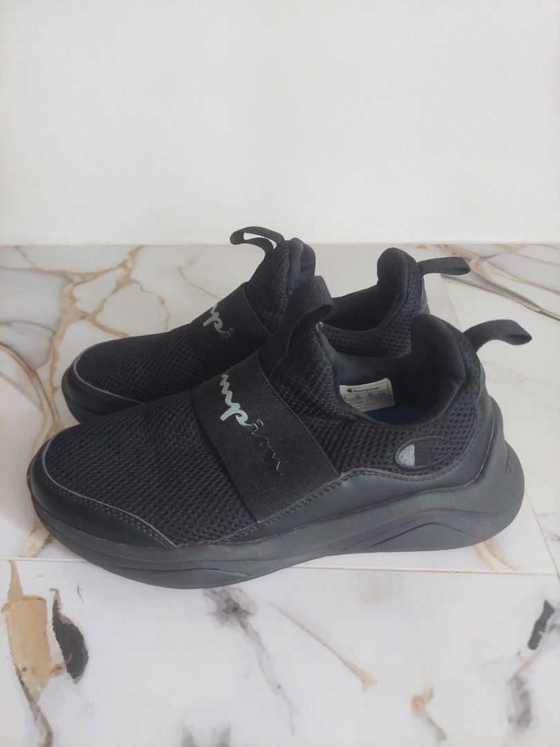 Champion Black Slip-On Sneakers (Category: Sneakers) located in Caloocan City. Submitted by mightydolphin_4fe0e3 (Listing ID 1436470122, Image 2). Description: - Champion black slip-on sneakers - Mesh upper for breathability - Features a branded strap - Champion logo detail on the sole - Comfortable for everyday wear - Stylish design.