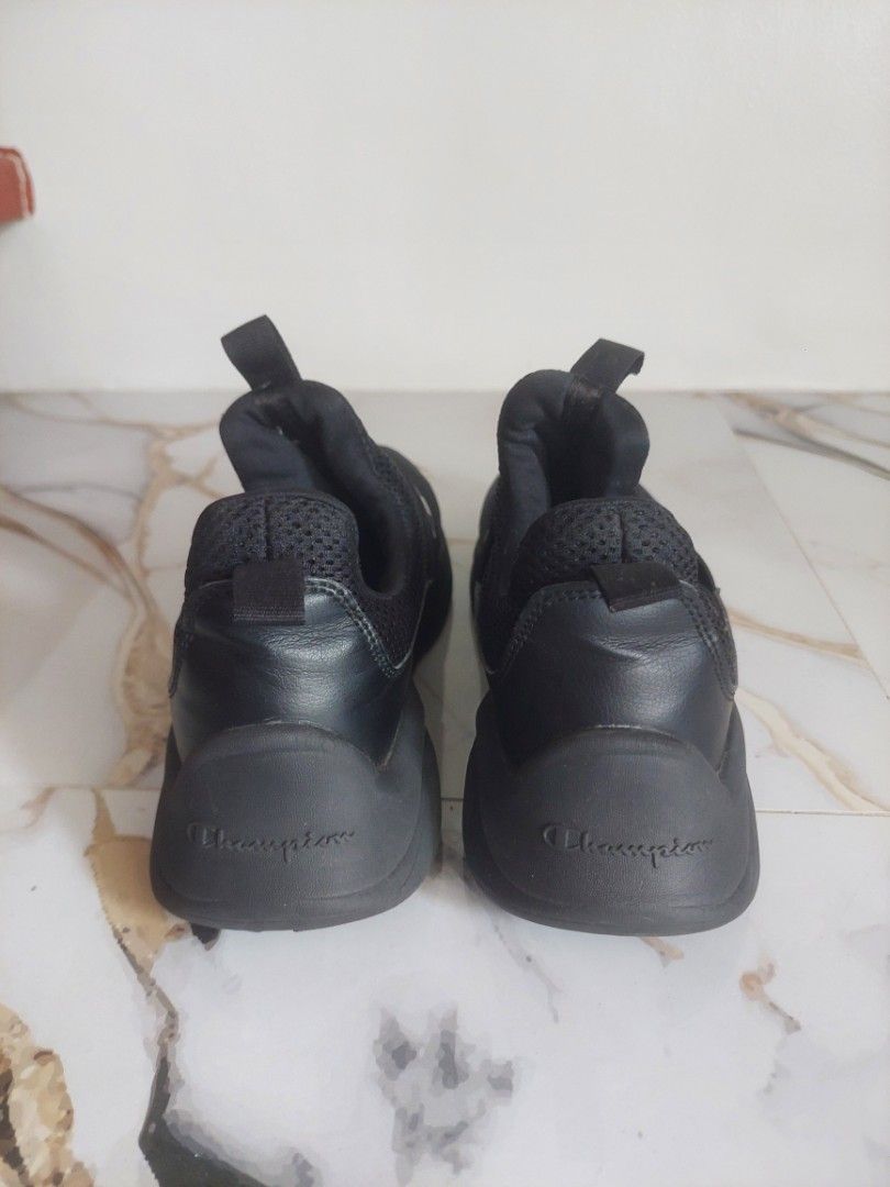 Champion Black Slip-On Sneakers (Category: Sneakers) located in Caloocan City. Submitted by mightydolphin_4fe0e3 (Listing ID 1436470122, Image 3). Description: - Champion black slip-on sneakers - Mesh upper for breathability - Features a branded strap - Champion logo detail on the sole - Comfortable for everyday wear - Stylish design.