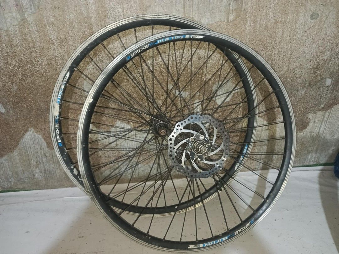 Clifton Spike Wheelset (Category: Bicycles) located in Manila. Submitted by youngcloud.e6e41e (Listing ID 1436361500, Image 1). Description: - Clifton Spike mountain bike wheels - Includes disc brake - Black rims with silver accents - Black spokes - Suitable for mountain bikes.