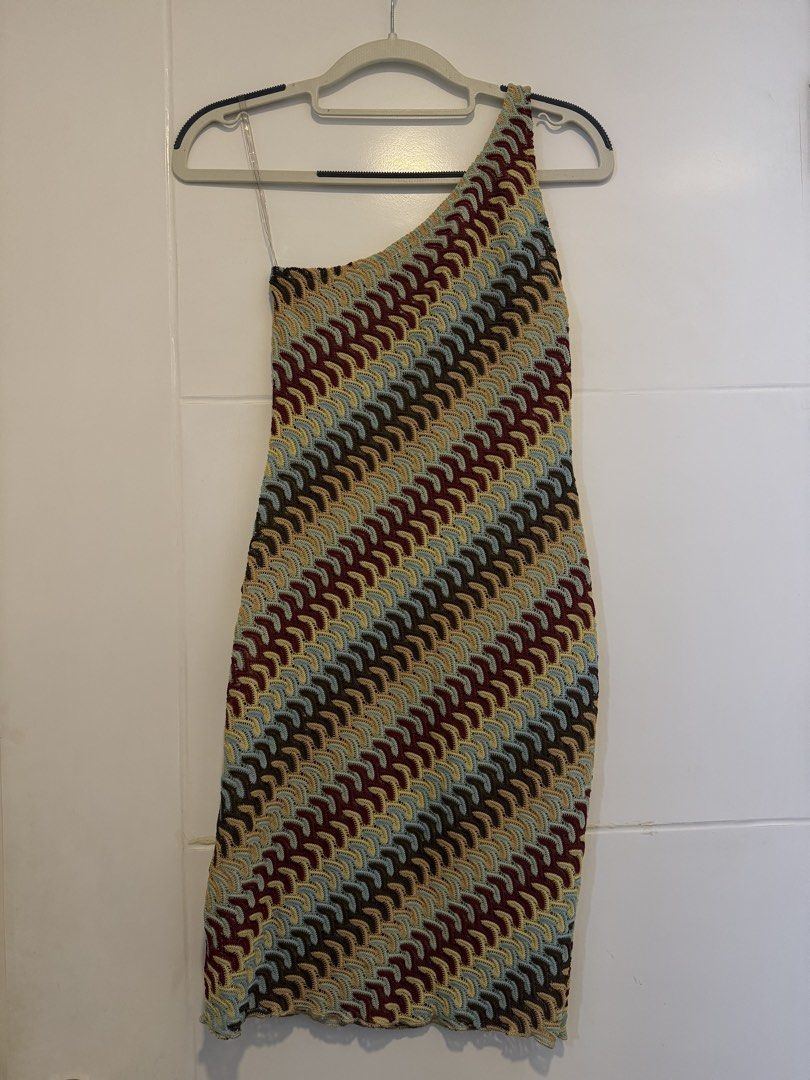 Crochet Dress (Category: Dresses) located in Makati City. Submitted by sphpnd (Listing ID 1436463817, Image 1). Description: - Unique one-shoulder design - Eye-catching crochet pattern - Bodycon fit - Mini length - Colorful pattern: red, yellow, blue, brown - Ideal for nights out and special occasions.