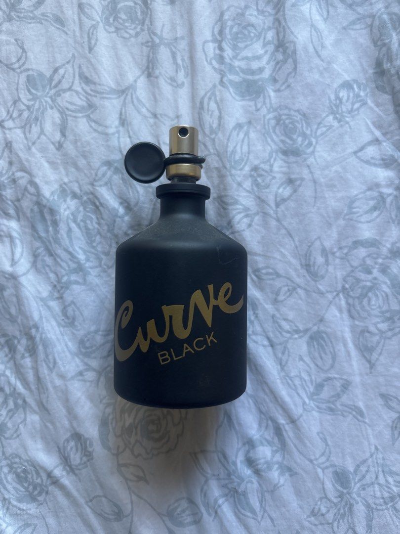 Curve Black Perfume (Category: Fragrance & Deodorants) located in Quezon City. Submitted by taberts (Listing ID 1436340039, Image 1). Description: - Curve Black perfume - Few sprays missing - With box.