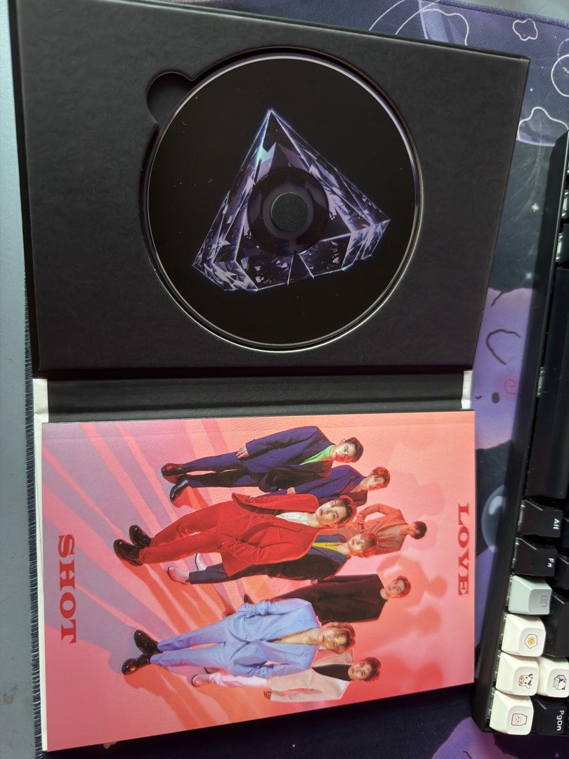 EXO - Love Shot Album (Category: CDs & DVDs) located in Manila. Submitted by yanyan_sells (Listing ID 1436386920, Image 2). Description: - EXO's 5th Repackage Album: Love Shot - Includes: CD and Photobook - Barely used, barely opened.