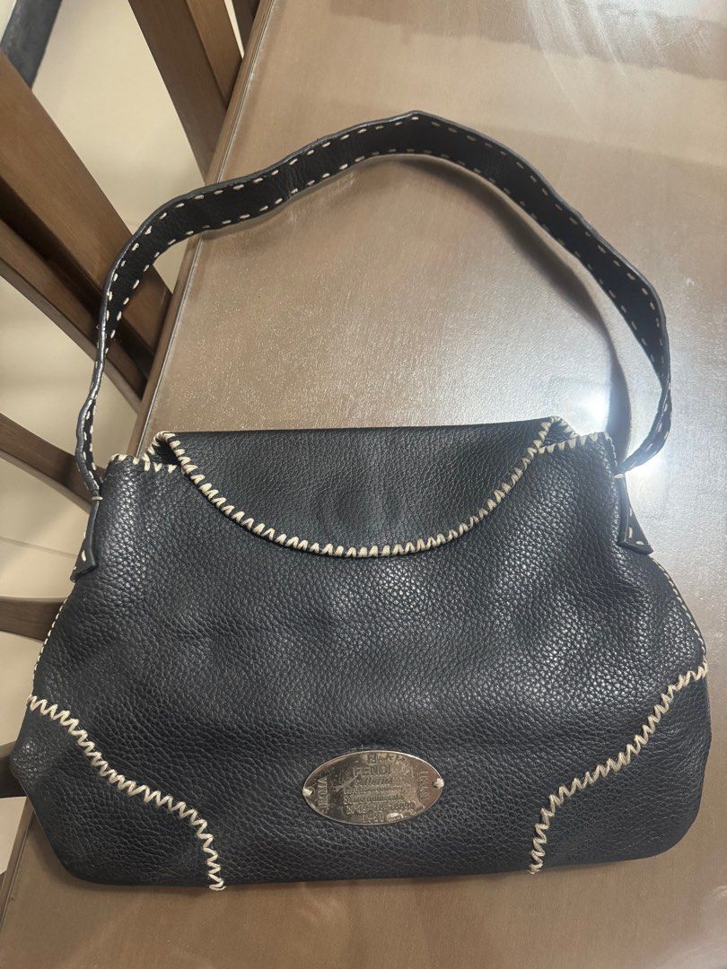F e n D i (Category: Shoulder Bags) located in Taytay. Submitted by destashingmomma (Listing ID 1436384135, Image 1). Description: Thrift sourced vintage Fendi selleria Shoulder kili bag Genuine leather Magnetic closure With serial code embossed in plate Measures 12 in wide 8.5 in high Rare find No guarantee no inclusions for thrift items.