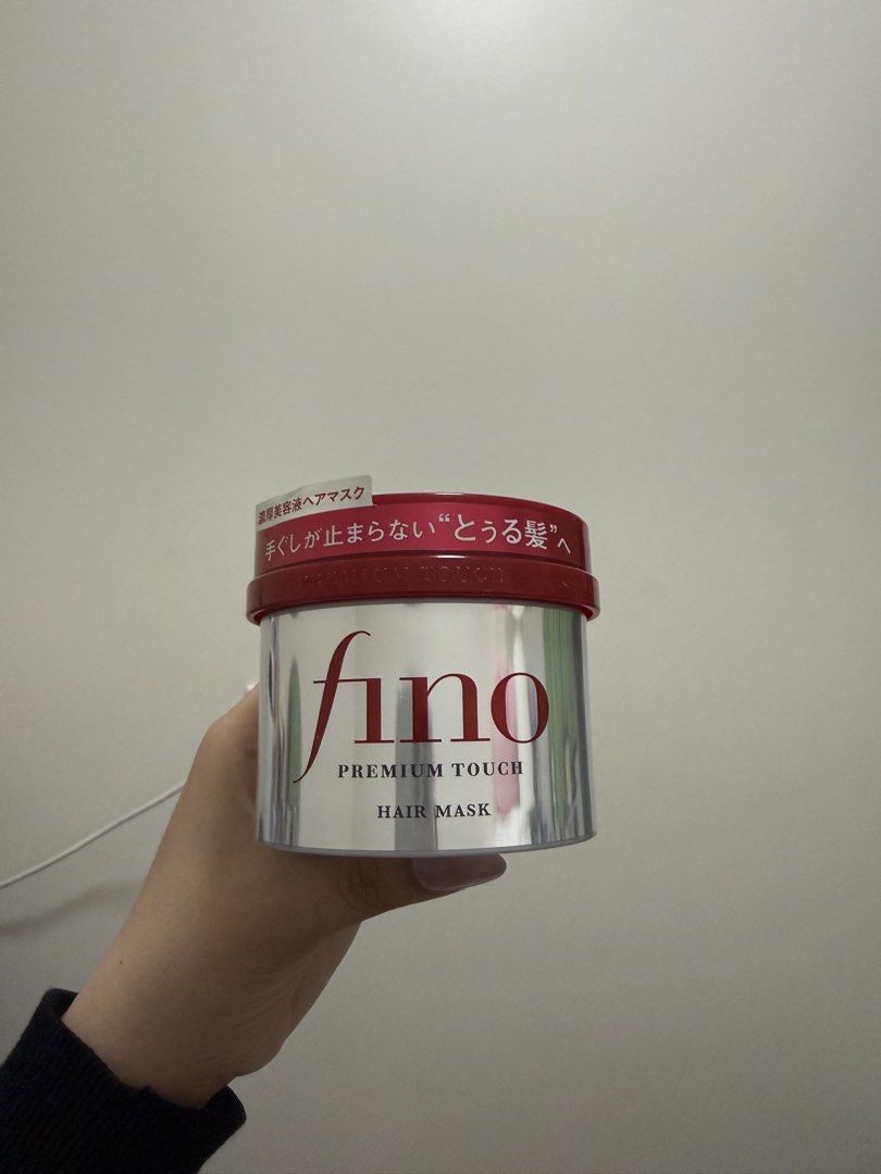 Fino Premium Touch Hair Mask (Category: Hair) located in Manila. Submitted by elynnethcampo11 (Listing ID 1436397709, Image 1). Description: - I personally bought these in Japan, so they’re definitely authentic and not fake. - Fino Premium Touch Hair Mask for deep conditioning and repair. - Formulated to moisturize and restore shine to damaged hair. - Comes in a round container. - Features a red lid and silver body. - Packaging includes Japanese 