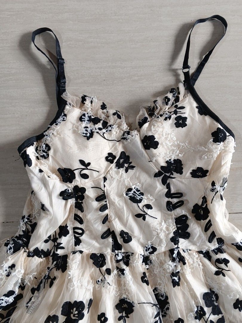 Mini Dress Floral Embroidered (Category: Dresses) located in Koronadal. Submitted by mskhangg (Listing ID 1436339543, Image 2). Description: - Cream dress with black floral embroidery - Spaghetti straps - Fitted bodice - Flared skirt - Black trim on straps and neckline - Suitable for casual and special occasions -Padded bra.