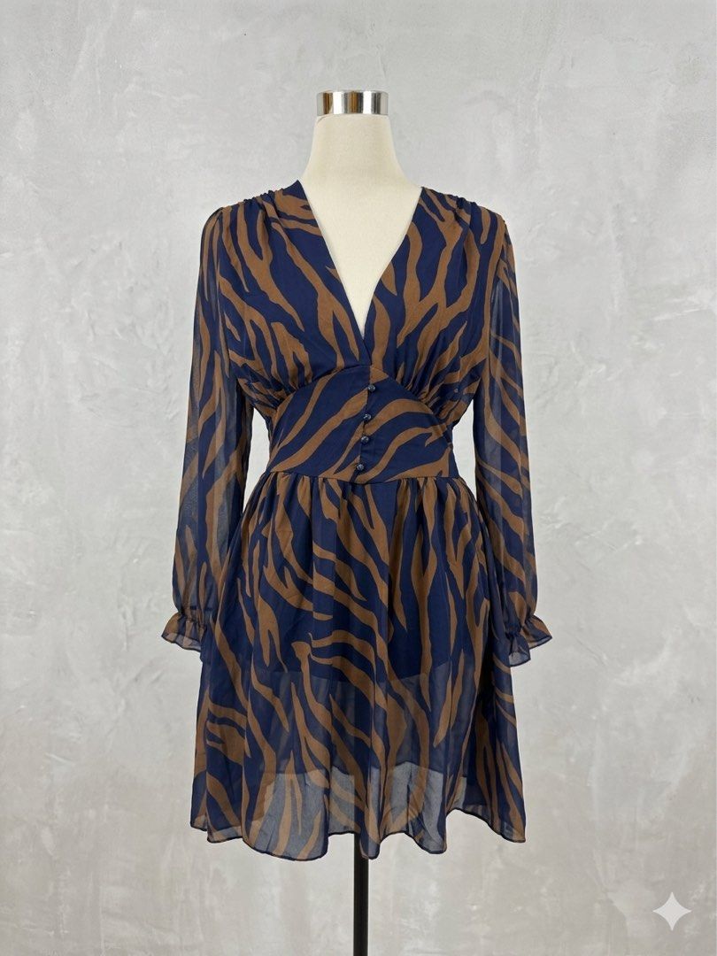 Formal dress animal print (Category: Dresses) located in Manila. Submitted by repeat_finds_ph (Listing ID 1436311242, Image 1). Description: 👉All are classified as thrifted (𝙪𝙣𝙬𝙖𝙨𝙝𝙚𝙙) some items may come with minor flaws due to pre-loved wear. 👉Color of product may slightly vary due to lighting, -— 🚗 𝐒𝐇𝐈𝐏𝐏𝐈𝐍𝐆 𝐃𝐄𝐓𝐀𝐈𝐋𝐒: Via Lalamove or direct J&T only Metro Manila: 75.00 Luzon: 95 Visayas/ Mindanao: 115 📍 Valenzuela CIty 