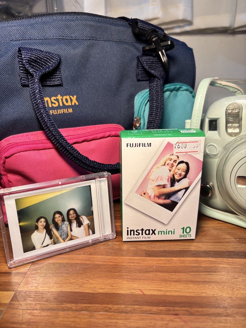 Fujifilm Instax Mini Film 10 Sheets (Category: Cameras) located in Angeles City. Submitted by riel4228 (Listing ID 1436339853, Image 1). Description: - Fujifilm Instax Mini film (10 sheets) - Includes a photo in a clear case - Compatible with Instax Mini cameras - Box shows a ¥600 price tag - Perfect for instant photos.