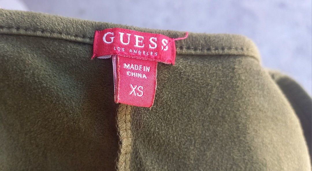 Guess V-Neck Dress XS (Category: Dresses) located in Lamut. Submitted by sakosack (Listing ID 1436289534, Image 3). Description: - Guess bodycon dress - Olive green - V-neck - Small chest pocket - Size: XS - Made in China.