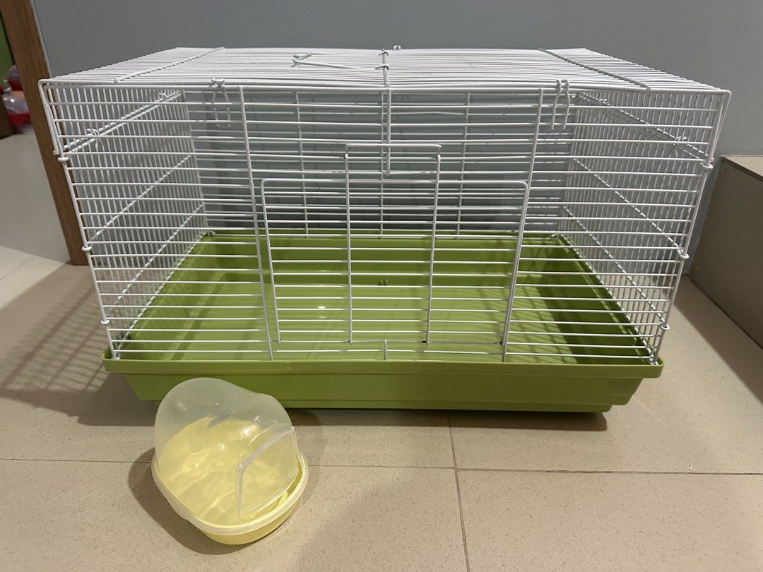 Hamster Cage with free toilet (Category: Homes & Other Pet Accessories) located in Caloocan City. Submitted by ashleyscorner (Listing ID 1436323414, Image 1). Description: - Hamster cage with white wire frame and green base. - Includes a small, yellow, enclosed accessory. - Features a top opening. - Attractive design on the base. - Suitable for small pets. size l-47 inches w-12inches h-12 inches.