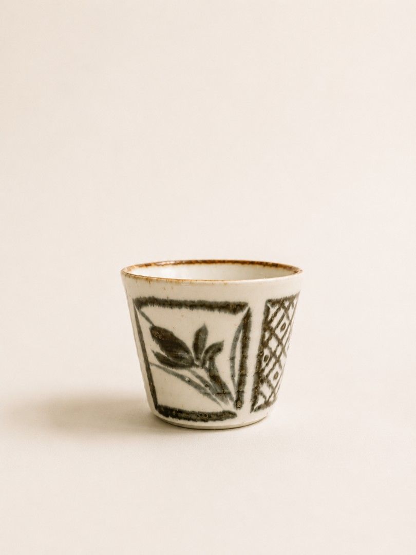 Ceramics/ Stoneware Cups (Category: Coffee & Tea Tableware) located in Manila. Submitted by colektura (Listing ID 1436394142, Image 2). Description: Set of unique, hand-painted stoneware cups. Each cup features a distinct design, including floral patterns and geometric motifs. The cups vary in shape and size. Perfect for serving tea, coffee, or as decorative pieces. .