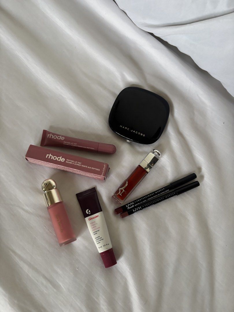 High end make ups (Category: Makeup) located in Quezon City. Submitted by kimchiefriedrice (Listing ID 1436444249, Image 1). Description: only dior lip maximizer and rare beauty avail!!! - Rhode Peptide Lip Tint (with original packaging) - SOLD - Glossier Cherry Balm Dotcom - SOLD - Marc Jacobs perfection powder - SOLD - Dior lipstick - NYX Professional Makeup lip liners - SOLD - Rare Beauty in the shade HAPPY.