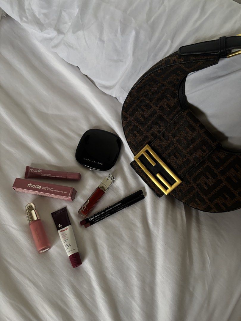 High end make ups (Category: Makeup) located in Quezon City. Submitted by kimchiefriedrice (Listing ID 1436444249, Image 3). Description: only dior lip maximizer and rare beauty avail!!! - Rhode Peptide Lip Tint (with original packaging) - SOLD - Glossier Cherry Balm Dotcom - SOLD - Marc Jacobs perfection powder - SOLD - Dior lipstick - NYX Professional Makeup lip liners - SOLD - Rare Beauty in the shade HAPPY.