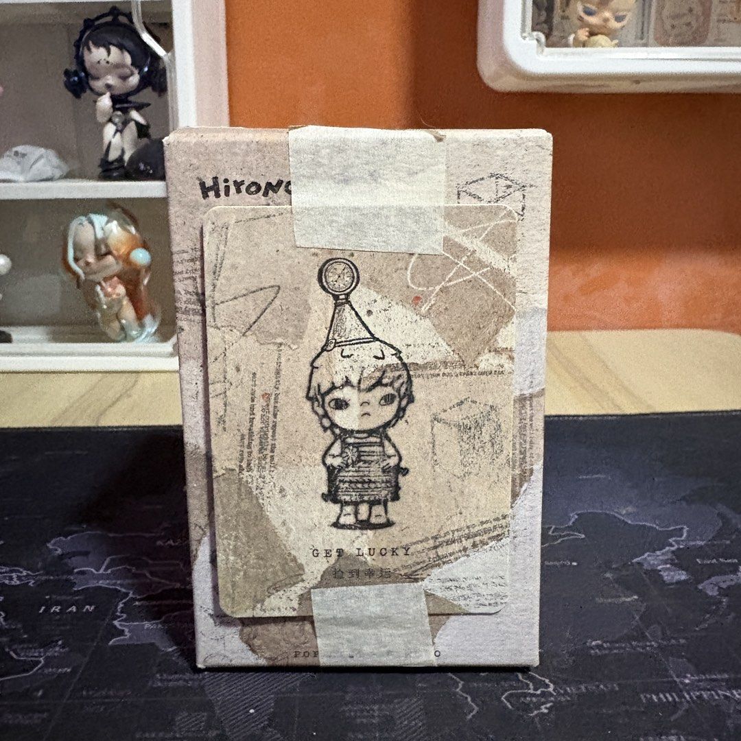 Hirono Get Lucky Blind Box Figure (Category: Designer & Blind Box Toys) located in Mandaluyong City. Submitted by batmanbale (Listing ID 1436287261, Image 1). Description: - Hirono Get Lucky blind box figure - Sealed box, ensuring figure's condition - Features a unique design - Part of a collectible series.