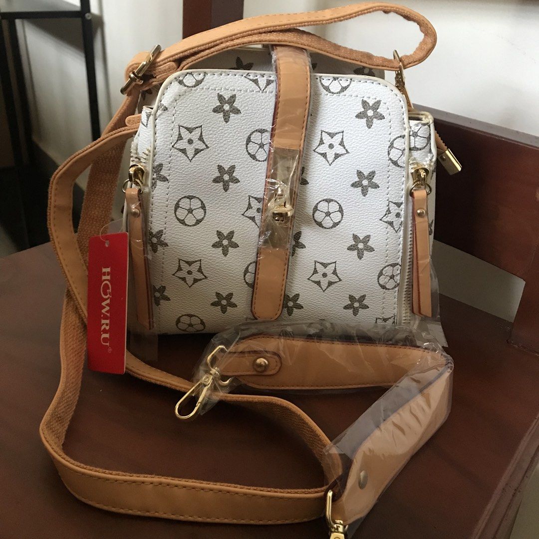 HOW R U White Sling/hand Bag (Category: Cross-body Bags) located in Manila. Submitted by bbeeaa (Listing ID 1436350047, Image 1). Description: .