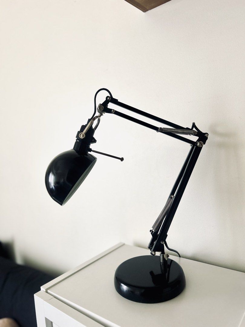 IKEA FORSA Desk Lamp (Category: Lighting) located in Quezon City. Submitted by gabbytan96 (Listing ID 1436395226, Image 2). Description: - IKEA adjustable desk lamp - Black finish - Flexible arm for easy positioning - Round base with IKEA logo - Energy-efficient LED bulb - Convenient on/off switch on the cord.
