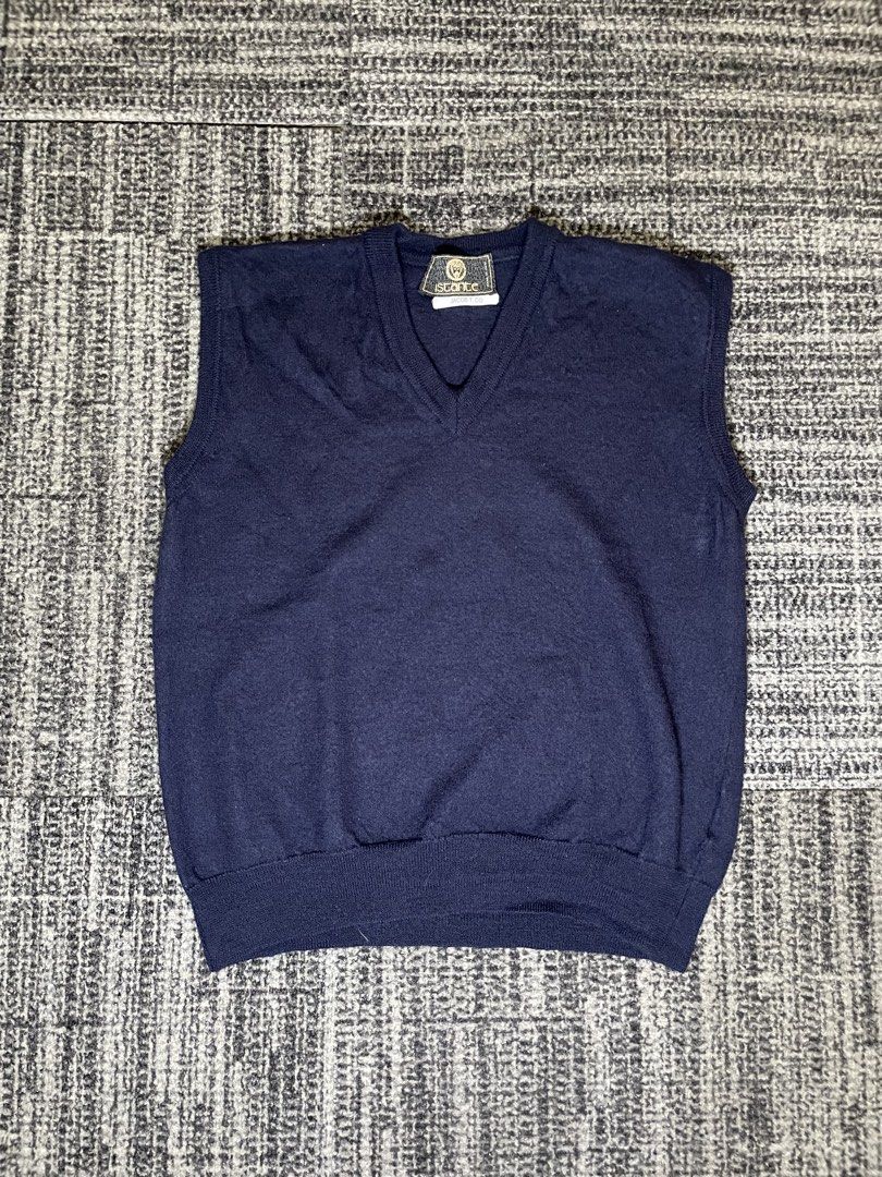 Istante Jacob Versace T. Co. Navy Blue Vest (Category: Vests) located in Taguig. Submitted by highlows (Listing ID 1436416789, Image 1). Description: - Istante Jacob T. Co. navy blue vest - Dimension: 18x20 - V-neck design - Made in Italy - 100% wool - Ribbed hem - Brand tag on neckline (Galassia production).