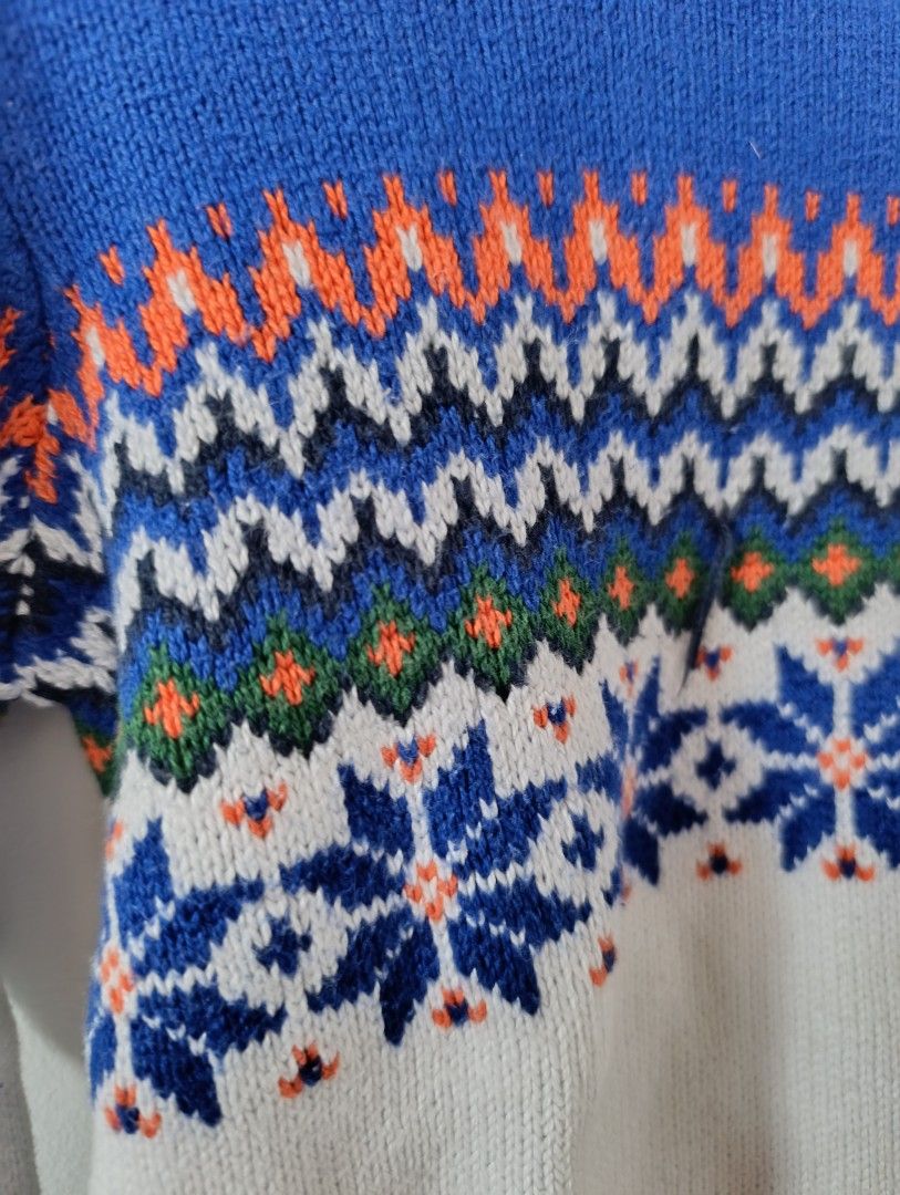 Janie and Jack Fair Isle Sweater - Size 6 (Category: Babies & Kids Fashion) located in Manila. Submitted by stuffsbybrix (Listing ID 1436367293, Image 2). Description: - Janie and Jack Fair Isle sweater - Size 6 - Crew neck, long sleeves - Color scheme: Blue base, white body, orange and blue patterned yoke - Design: Snowflakes and geometric patterns - Condition: Minor thread pull on front rfs: decluttering/outgrown .