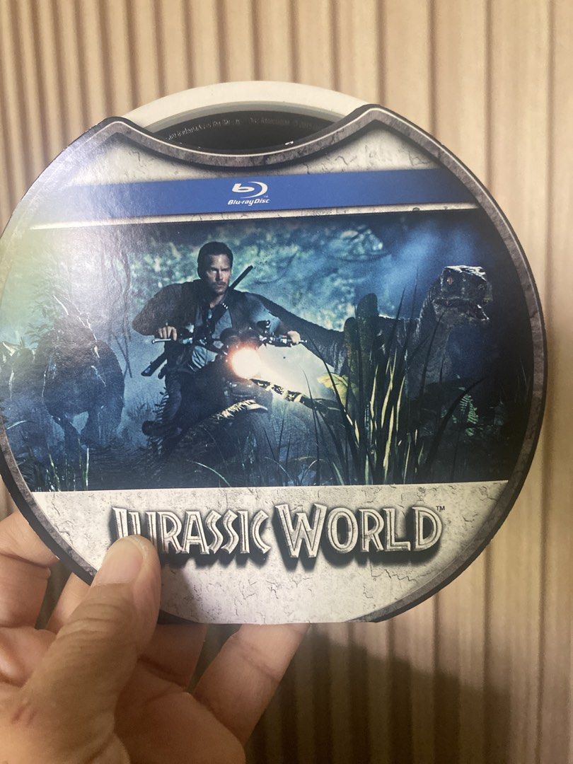 Jurassic World Blu-ray and DVD Set (Category: CDs & DVDs) located in Marikina City. Submitted by lay_away_ok (Listing ID 1436309231, Image 3). Description: - Jurassic World Blu-ray and DVD set - Features the Jurassic World logo and movie imagery - Includes both Blu-ray and DVD discs - Discs housed in a unique circular case - Great for Jurassic World fans!.