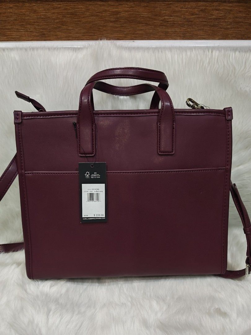 Karl Lagerfeld Tote Bag ORIGINAL (Category: Tote Bags) located in Marikina City. Submitted by BrandedStuffz (Listing ID 1436410556, Image 3). Description: Structured tote with double top handles and a detachable, adjustable crossbody strap Brand New and tag and care card Guaranteed Original and Legit from USA 🇺🇸. Moneyback if proven fake..
