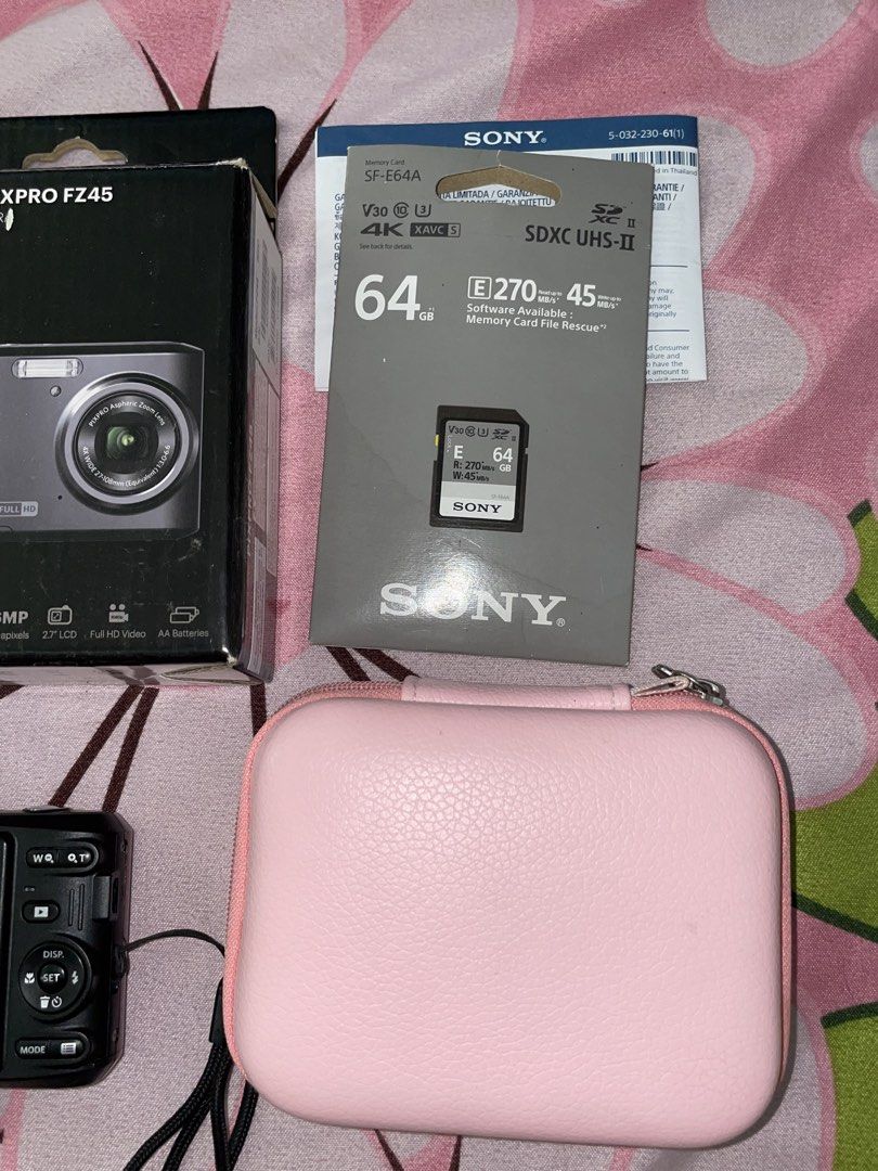 kodak fz45 (Category: Cameras) located in Manila. Submitted by zelestaire.10 (Listing ID 1436401965, Image 2). Description: Kodak PixPro FZ45 • deli batteries (2) • wrist strap • USB cable • with 64GB Sony SD card • with OTG card reader • pink camera case .