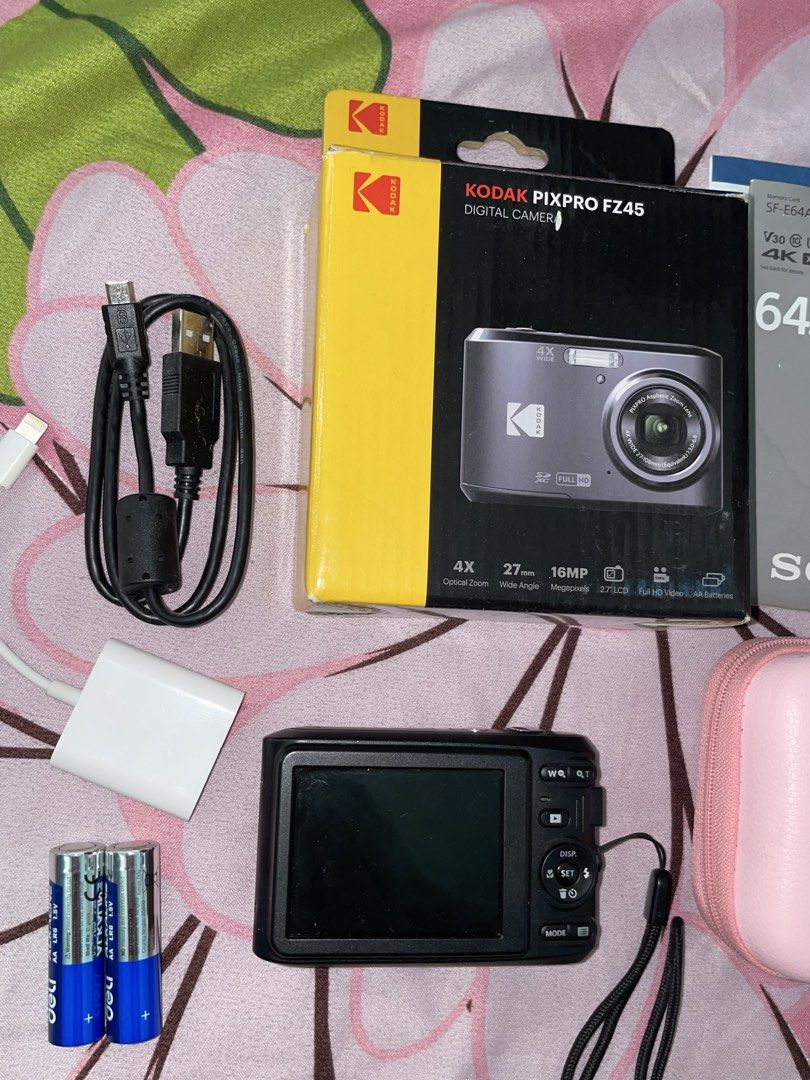 kodak fz45 (Category: Cameras) located in Manila. Submitted by zelestaire.10 (Listing ID 1436401965, Image 3). Description: Kodak PixPro FZ45 • deli batteries (2) • wrist strap • USB cable • with 64GB Sony SD card • with OTG card reader • pink camera case .