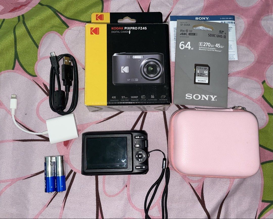 kodak fz45 (Category: Cameras) located in Manila. Submitted by zelestaire.10 (Listing ID 1436401965, Image 1). Description: Kodak PixPro FZ45 • deli batteries (2) • wrist strap • USB cable • with 64GB Sony SD card • with OTG card reader • pink camera case .