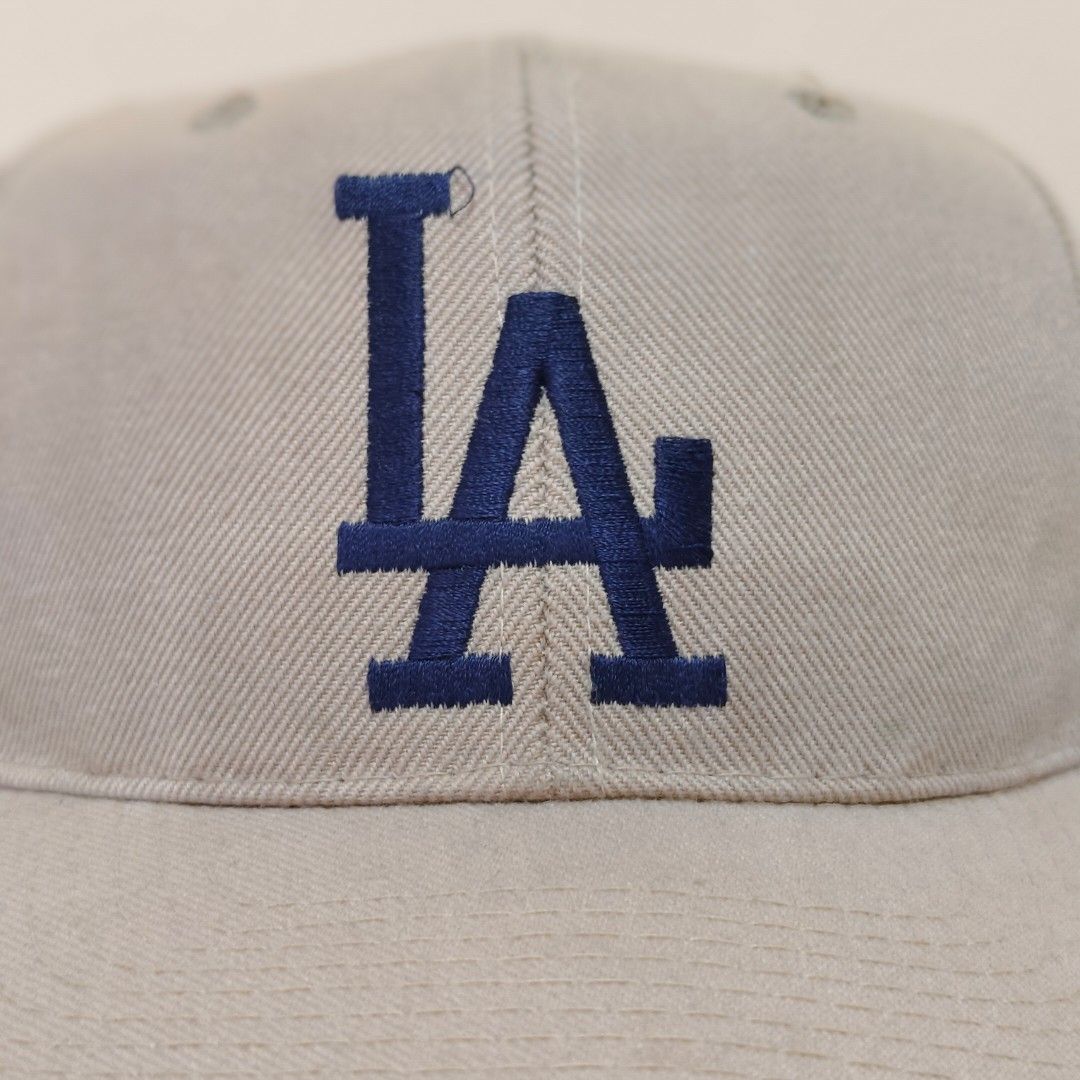 LA Dodgers Cap (bootleg) (Category: Caps & Hats) located in Manila. Submitted by pogipabili (Listing ID 1436332014, Image 2). Description: - Features the iconic LA Dodgers logo. - Adjustable strap for a comfortable fit. - Made from a blend of wool and acrylic. - Authentic Korean-made cap..