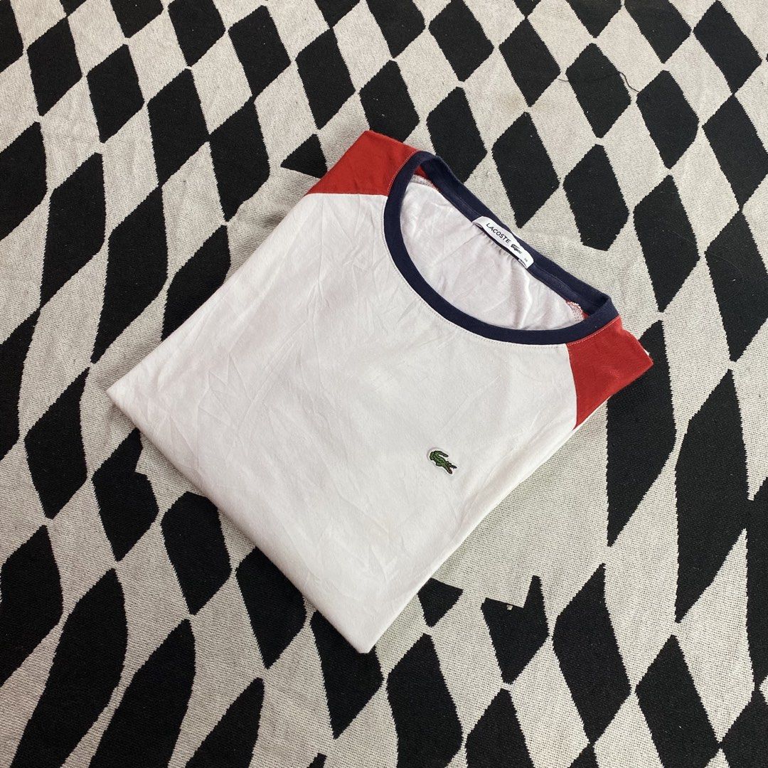 Lacoste Long Sleeve Raglan Shirt (Category: Tshirts & Polo Shirts ) located in Cebu City. Submitted by christianthrifteddd (Listing ID 1436443905, Image 2). Description: - Authentic Lacoste long sleeve shirt - White body with red raglan sleeves - Navy blue neckline - Lacoste logo on chest - Size 38 - Made in Korea.