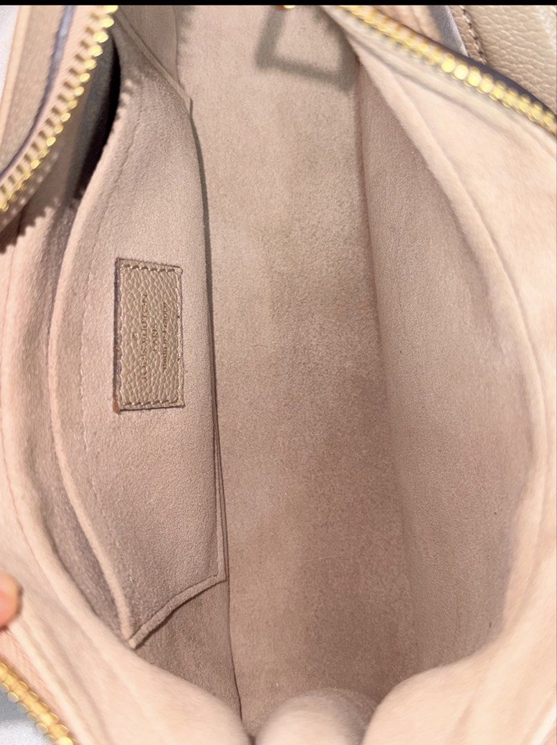 Louis Vuitton Bagatelle NM (Category: Luxury Bags & Wallets) located in Taguig. Submitted by aa_decluttering (Listing ID 1436420641, Image 3). Description: Louis Vuitton Bagatelle NM Material: Monogram Empreinte Giant (Embossed grained cowhide leather) • Color: Tourterelle / Dove (Bicolour) • Hardware: Gold-color hardware • Dimensions: 22 x 14 x 9 cm (Length x Height x Width) • Features: * Removable handle for hand or short-shoulder carry. • Remo
