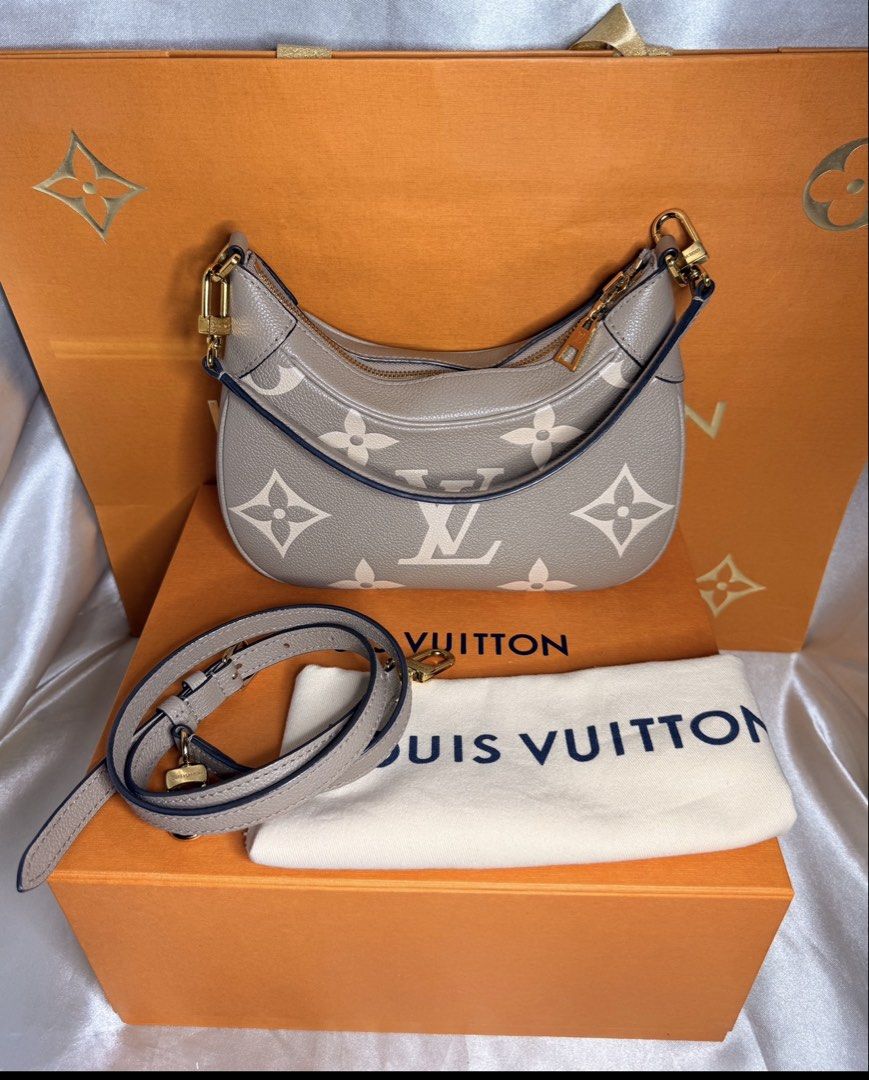 Louis Vuitton Bagatelle NM (Category: Luxury Bags & Wallets) located in Taguig. Submitted by aa_decluttering (Listing ID 1436420641, Image 2). Description: Louis Vuitton Bagatelle NM Material: Monogram Empreinte Giant (Embossed grained cowhide leather) • Color: Tourterelle / Dove (Bicolour) • Hardware: Gold-color hardware • Dimensions: 22 x 14 x 9 cm (Length x Height x Width) • Features: * Removable handle for hand or short-shoulder carry. • Remo