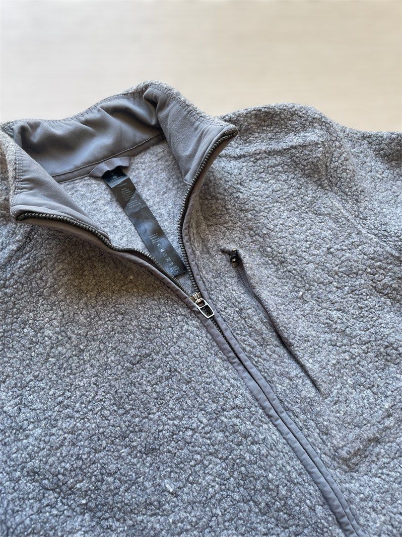 Lululemon Tundra Trek Jacket (Category: Coats, Jackets and Outerwear) located in Mataasnakahoy. Submitted by zero4thrift (Listing ID 1436377764, Image 2). Description: Lululemon Tundra Trek Jacket - Lululemon jacket - Full zip closure - High collar - Gray, textured fleece exterior - Smooth panels on sides - Two front pockets - Small chest pocket - Made in Bangladesh Size Medium on tag 21-22 “ width 25 1/2 “ length 24 1/2 “ sleeves Very good condi