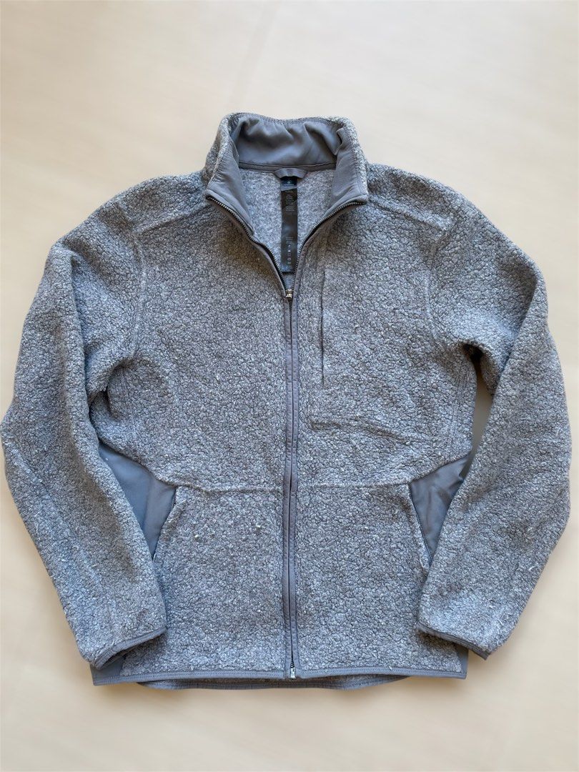 Lululemon Tundra Trek Jacket (Category: Coats, Jackets and Outerwear) located in Mataasnakahoy. Submitted by zero4thrift (Listing ID 1436377764, Image 1). Description: Lululemon Tundra Trek Jacket - Lululemon jacket - Full zip closure - High collar - Gray, textured fleece exterior - Smooth panels on sides - Two front pockets - Small chest pocket - Made in Bangladesh Size Medium on tag 21-22 “ width 25 1/2 “ length 24 1/2 “ sleeves Very good condi