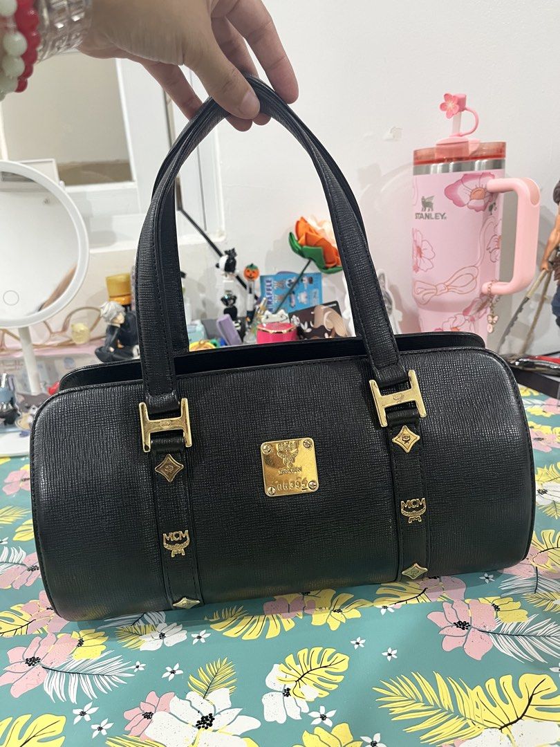 MCM Black Handbag (Category: Luxury Bags & Wallets) located in Bulacan. Submitted by nyawnyaww (Listing ID 1436303600, Image 1). Description: - Black MCM handbag - Gold-tone hardware PLEASE CHECK ALL PHOTOS FOR DETAILS.