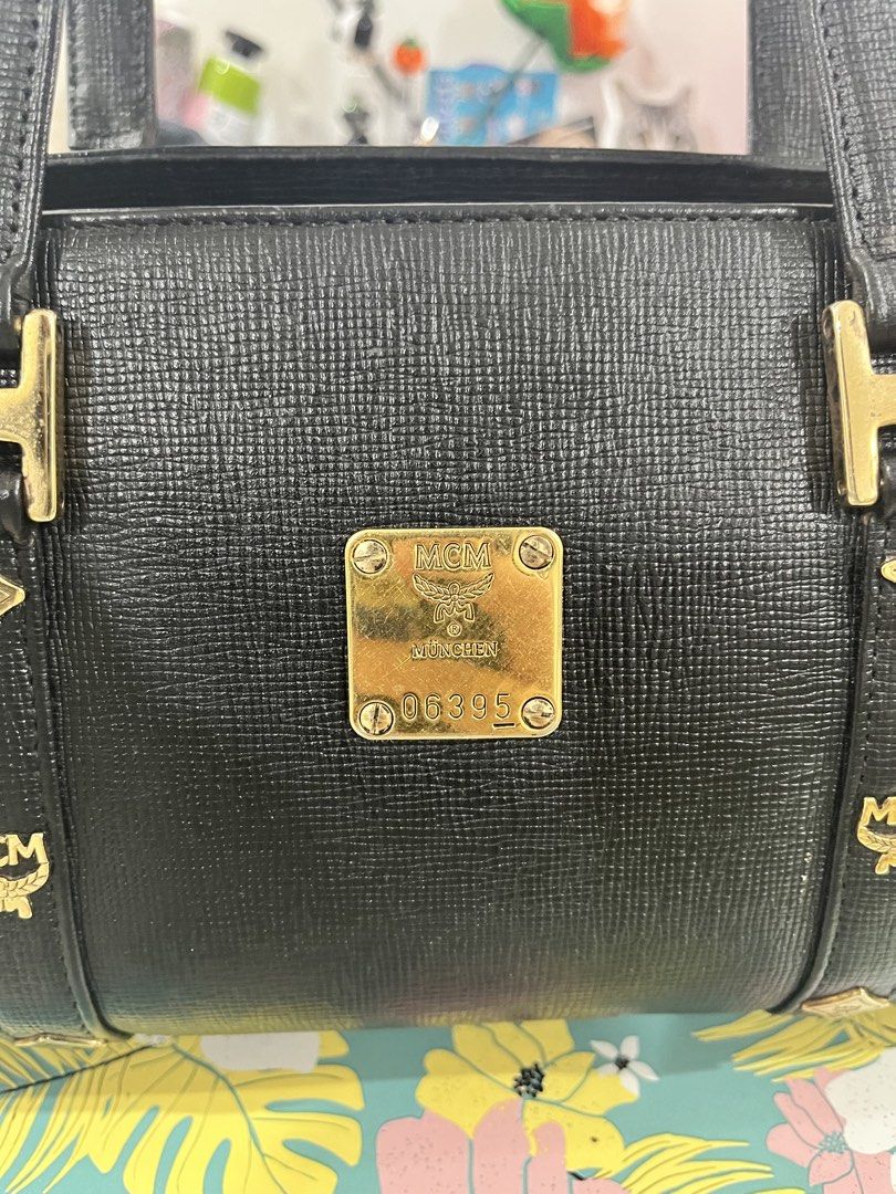 MCM Black Handbag (Category: Luxury Bags & Wallets) located in Bulacan. Submitted by nyawnyaww (Listing ID 1436303600, Image 2). Description: - Black MCM handbag - Gold-tone hardware PLEASE CHECK ALL PHOTOS FOR DETAILS.