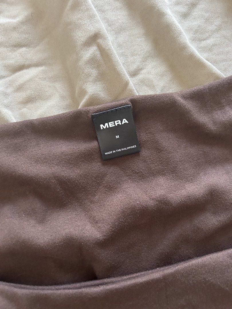 Mera Brown Long Sleeve Top (Category: Longsleeves) located in Binan City. Submitted by missrandomthings (Listing ID 1436365274, Image 2). Description: - Mera brown long sleeve top - Square neckline - Size M - Made in the Philippines - Soft, comfortable material - Versatile: Dress up or down - Perfect for layering.