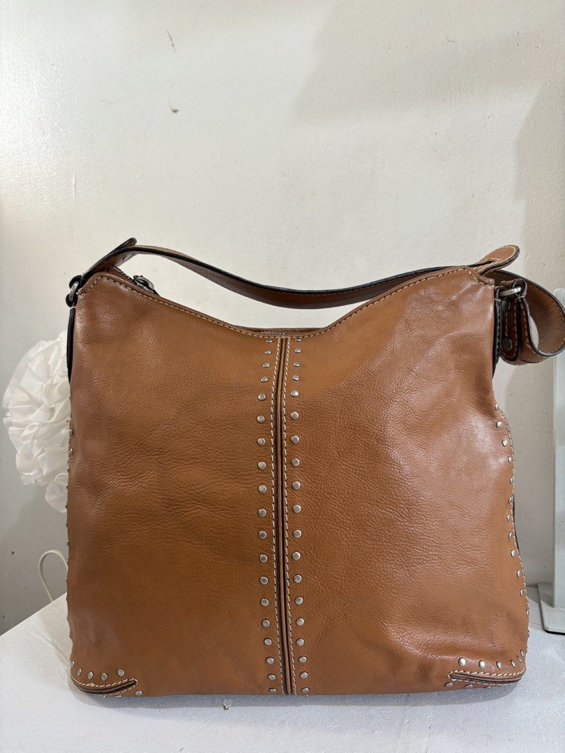 Michael Kors Studded Shoulder Bag/ Hobo Bag (Category: Shoulder Bags) located in Quezon City. Submitted by geminiselection (Listing ID 1436353057, Image 2). Description: Genuine Leather 💯 Authentic 💯 Super ganda padin in person Very spacious, perfecr pang everyday Nagkaroon lang ng watermark which is hindi naman halata overall maganda pa 🙂.