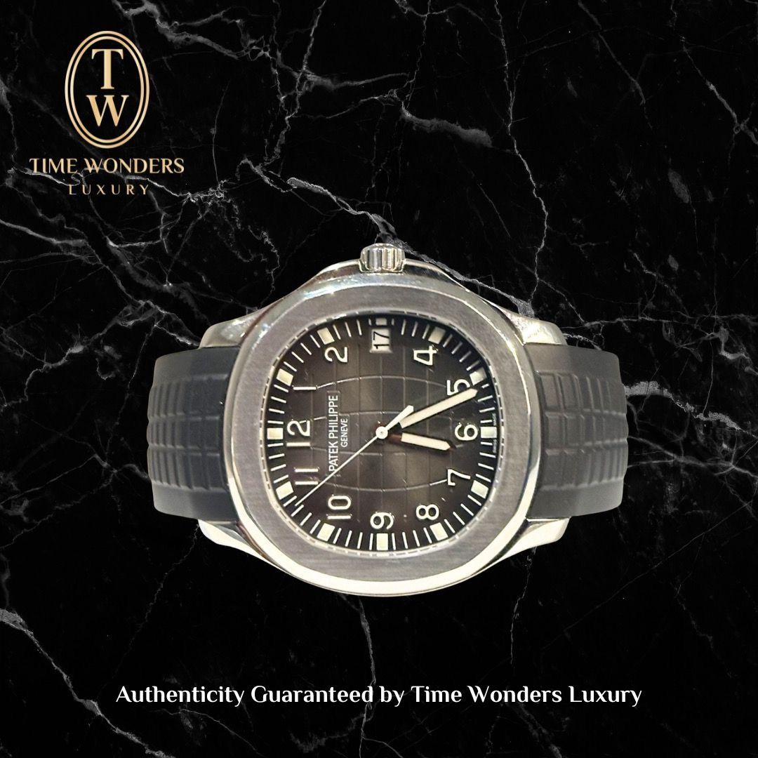 Mint Q3 2019 Patek Philippe Aquanaut 5167A Black Stainless Steel 5167 (Category: Watches) located in Singapore. Submitted by timewondersluxury (Listing ID 1436346876, Image 1). Description: Brand: Patek Philippe Model: 5167A Condition: Mint Dial: Black Case Diameter: 40mm Movement : Automatic Material: Stainless Steel Bracelet: Rubber Strap Original Box: Yes Original Cert/Papers: Yes Dated: Q3 2019 Warranty: 1 YEAR WARRANTY BY TIME WONDERS LUXURY