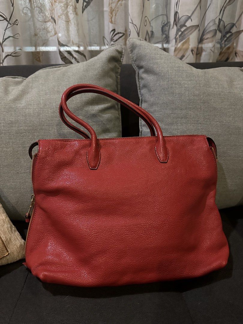 Miu Miu Red Leather Handbag (Category: Luxury Bags & Wallets) located in Manila. Submitted by jerramarieee (Listing ID 1436461997, Image 3). Description: - Authentic Miu Miu handbag - Color: Red - Material: Leather (textured) - Design: Top handle - Closure: Zip - Features: Front zip pocket, detachable shoulder strap - Hardware: Gold-tone - Branding: Miu Miu logo on front • Original Price: Approx. $1,495 (Approx. ₱86,000) • Selling Price: ₱15,000.