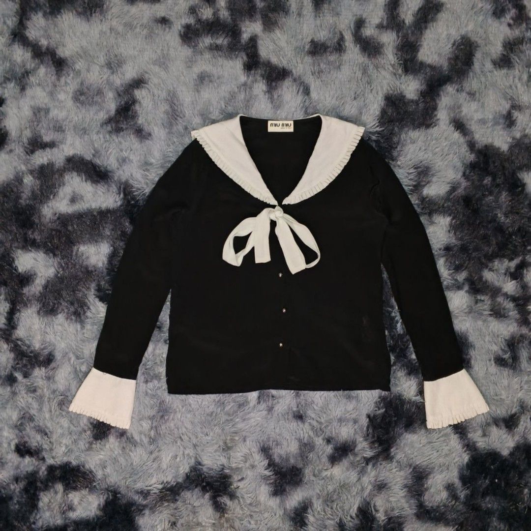 Miu Miu Silk Long Sleeve Blouse (Category: Luxury Apparel) located in Dagupan City. Submitted by finestthriftstuffph (Listing ID 1436408428, Image 1). Description: - (Authentic) Very Presentable Size: 36 on Tag (Measured by INCHES) Width: 20 Length: 23 Shoulder: 17 Sleeve: 24 Condition: As New Color Rate: 10/10 Issue: None "Colors may vary due to lightning" "Swipe each photo to see more details".