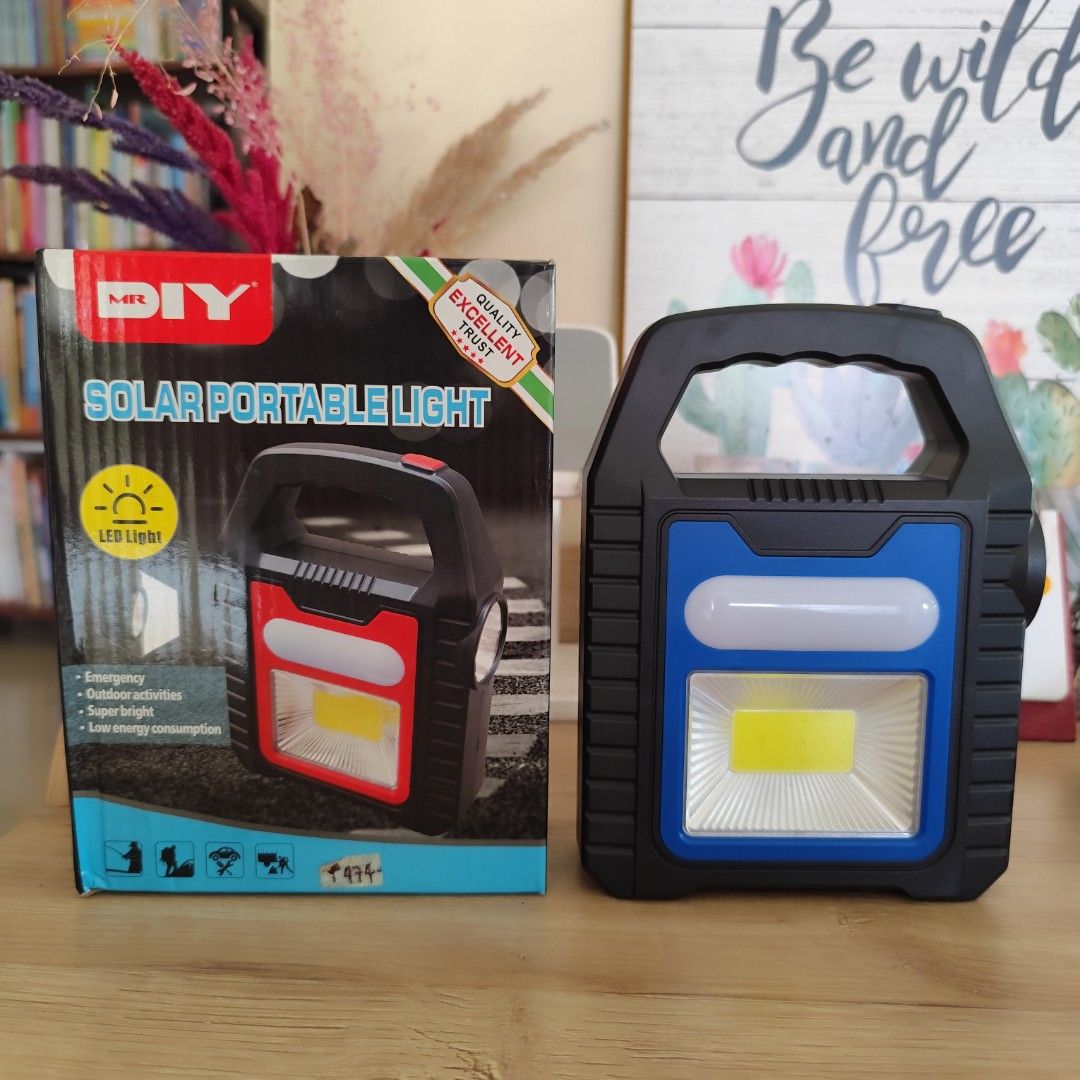 mr.diy Solar Portable Light (Category: Lighting) located in Baao. Submitted by elis.closet (Listing ID 1436308753, Image 1). Description: Solar portable light from MR.DIY is perfect for emergencies and outdoor activities. It features LED light and is super bright. It also has low energy consumption. The light has a handle for easy carrying and a blue and black color scheme..