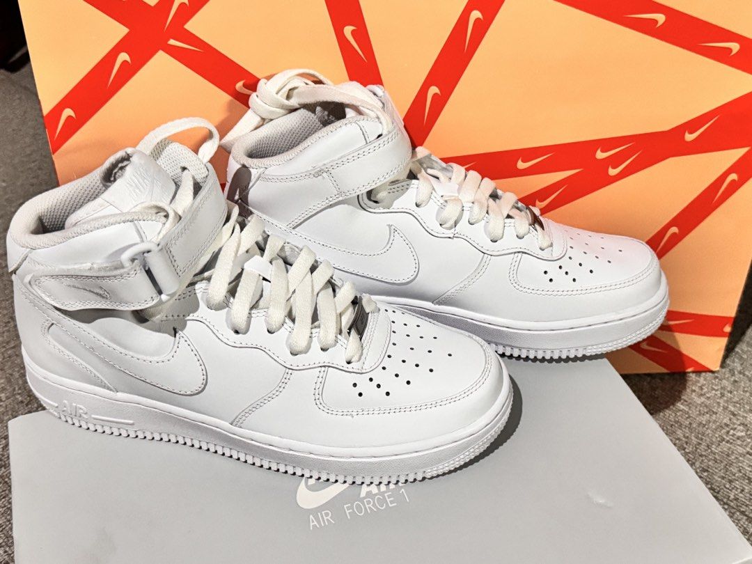 Nike Air Force 1 '07 Mid White Sneakers (Category: Sneakers) located in Obando. Submitted by pepperooshop (Listing ID 1436301793, Image 3). Description: - Nike Air Force 1 '07 Mid - White colorway - Size: US 7.5, UK 5, EUR 38.5 - Mid-top design with strap closure.
