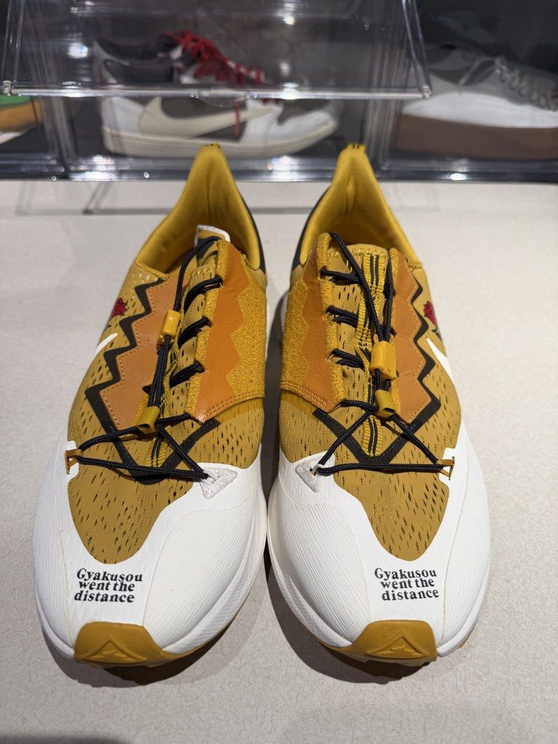 Nike Gyakusou Pegasus Trail 3 (Category: Sneakers) located in Quezon City. Submitted by declutterqueenhigh5 (Listing ID 1436468622, Image 2). Description: - Nike Gyakusou Pegasus Trail 3 sneakers - Color: Yellow and White - Features "Gyakusou went the distance" text on the toe - Trail-ready sole - Distinctive lacing system - Gyakusou logo on the heel -USED ONCE.