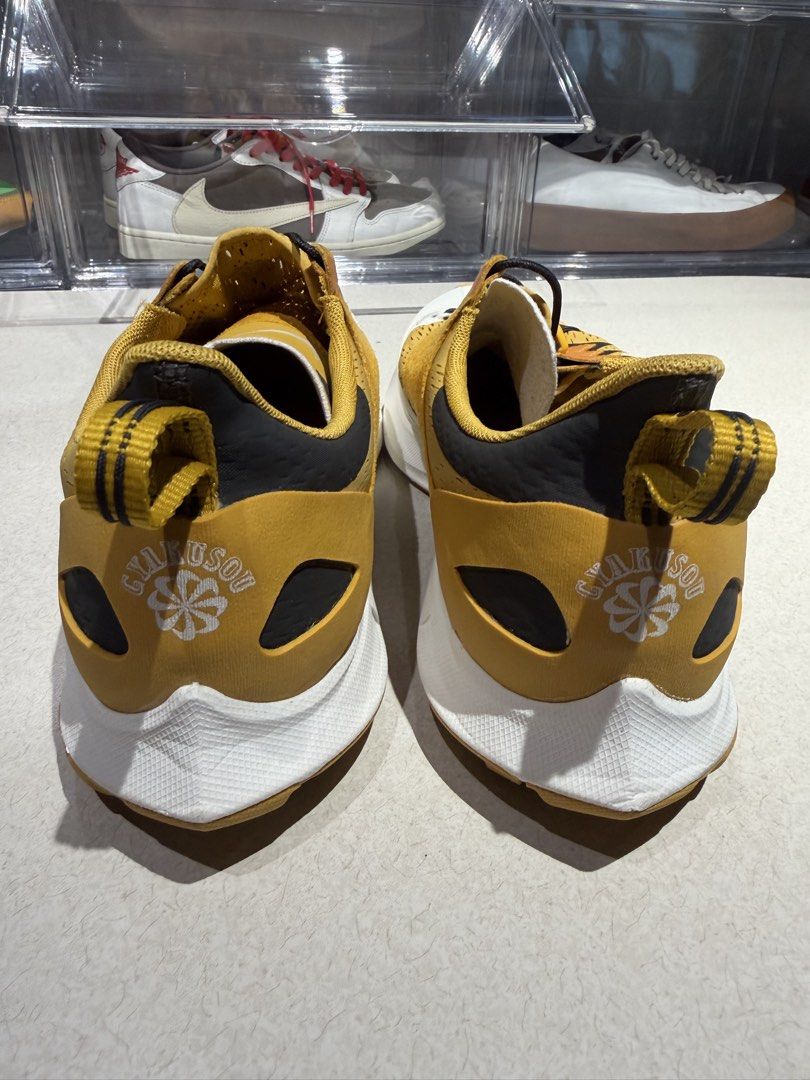 Nike Gyakusou Pegasus Trail 3 (Category: Sneakers) located in Quezon City. Submitted by declutterqueenhigh5 (Listing ID 1436468622, Image 3). Description: - Nike Gyakusou Pegasus Trail 3 sneakers - Color: Yellow and White - Features "Gyakusou went the distance" text on the toe - Trail-ready sole - Distinctive lacing system - Gyakusou logo on the heel -USED ONCE.