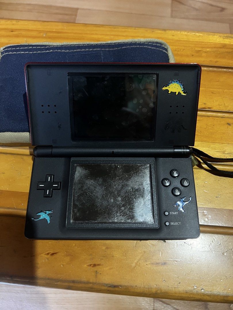 Nintendo DS Lite Red as is (Category: Nintendo) located in Davao. Submitted by john_juan86 (Listing ID 1436321203, Image 2). Description: - Red Nintendo DS Lite with dinosaur stickers - As is.
