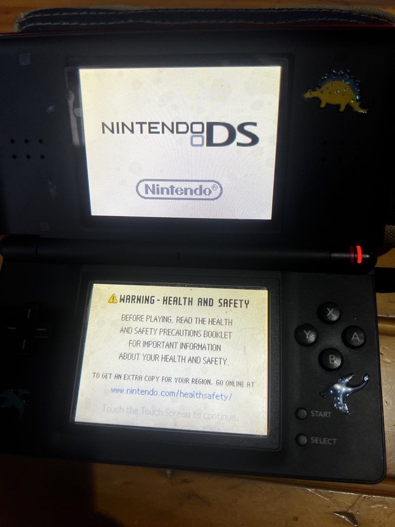 Nintendo DS Lite Red as is (Category: Nintendo) located in Davao. Submitted by john_juan86 (Listing ID 1436321203, Image 3). Description: - Red Nintendo DS Lite with dinosaur stickers - As is.