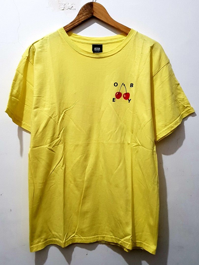 Obey Cherry Logo T-shirt - Yellow (Category: Tshirts & Polo Shirts ) located in Taguig. Submitted by thriftedminds (Listing ID 1436438252, Image 2). Description: - Obey t-shirt - Yellow color - Features the iconic cherry logo (front and back) - Crew neck - Short sleeves - Size: Medium - Made in Mexico.