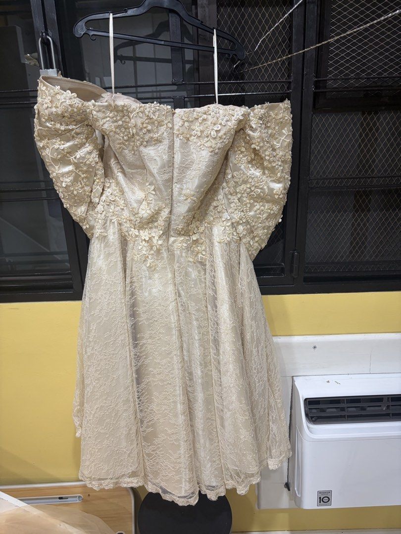 Off-Shoulder Filipiniana Dress (Category: Dresses) located in Marikina City. Submitted by vderxsp (Listing ID 1436438646, Image 2). Description: - Light beige off-shoulder cocktail dress - Intricate floral embellishments - Flattering A-line skirt - Knee-length - Ideal for special occasions.